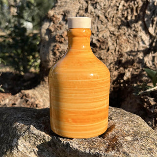 Bottiglia in ceramica spennellata arancio