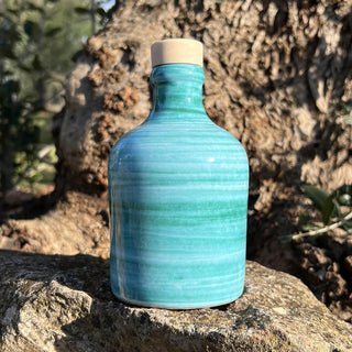 Bottiglia in ceramica spennellata verde ramina