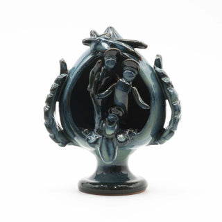 Pumo pine cone nativity scene iridescent green