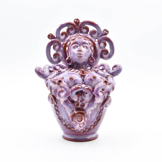 Iridescent pink ceramic doll