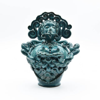 Dark green iridescent ceramic doll