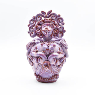 Iridescent pink ceramic doll
