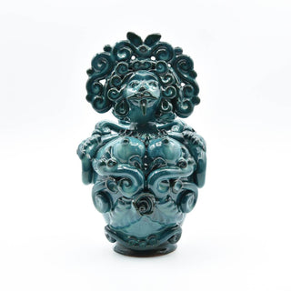 Dark green iridescent ceramic doll