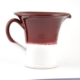 Antique red ceramic jug